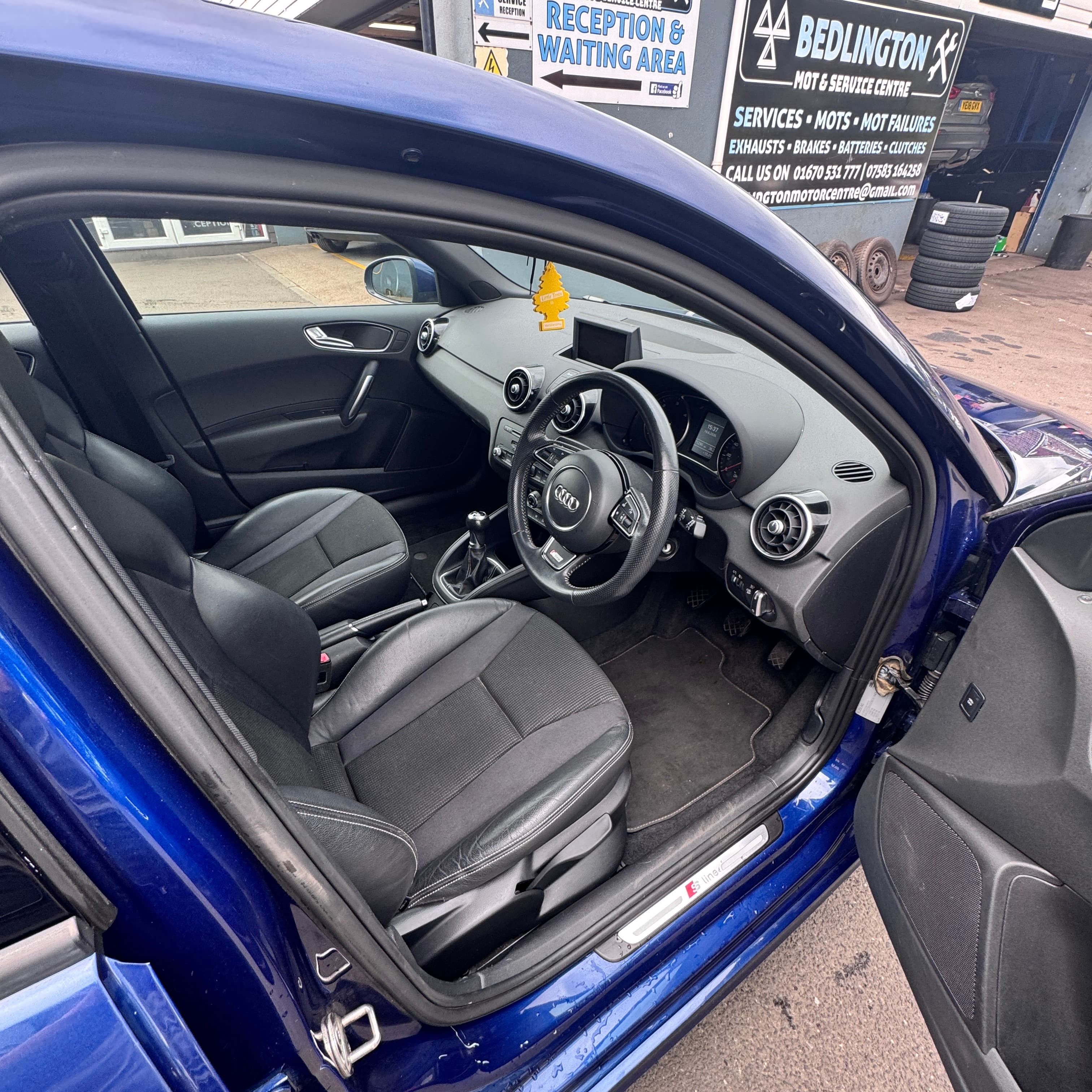 Vehicle photo — front interior