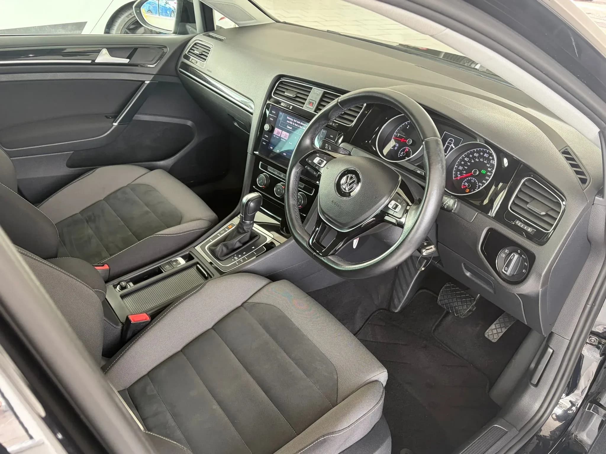 Vehicle photo — front interior