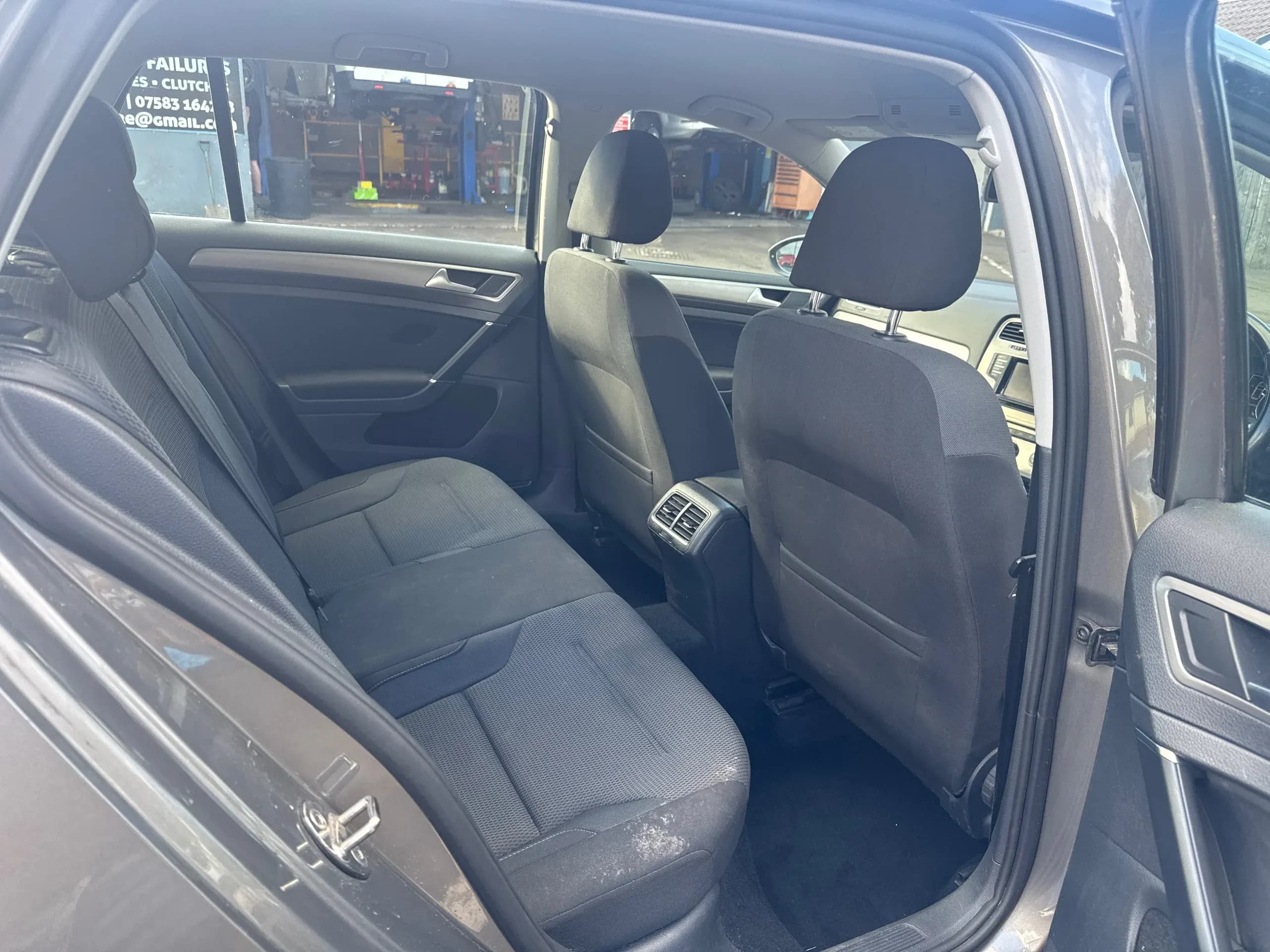 Vehicle photo — rear interior