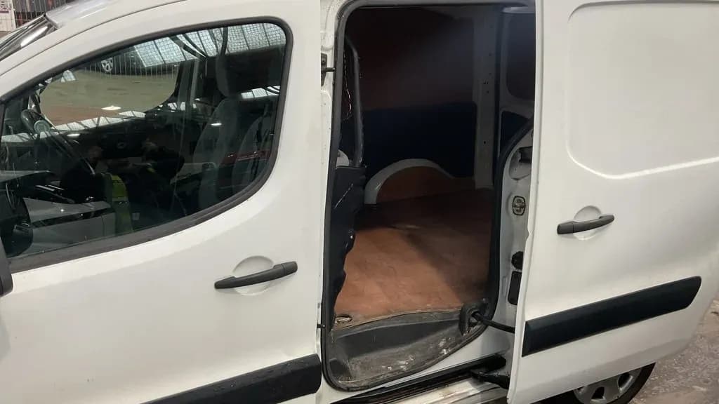 Vehicle photo — rear interior