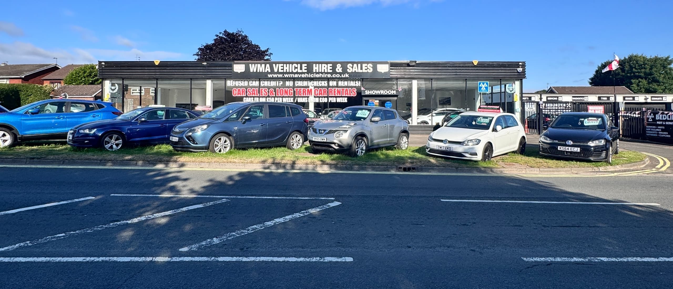 Cars lined up on the WMA Motors forecourt