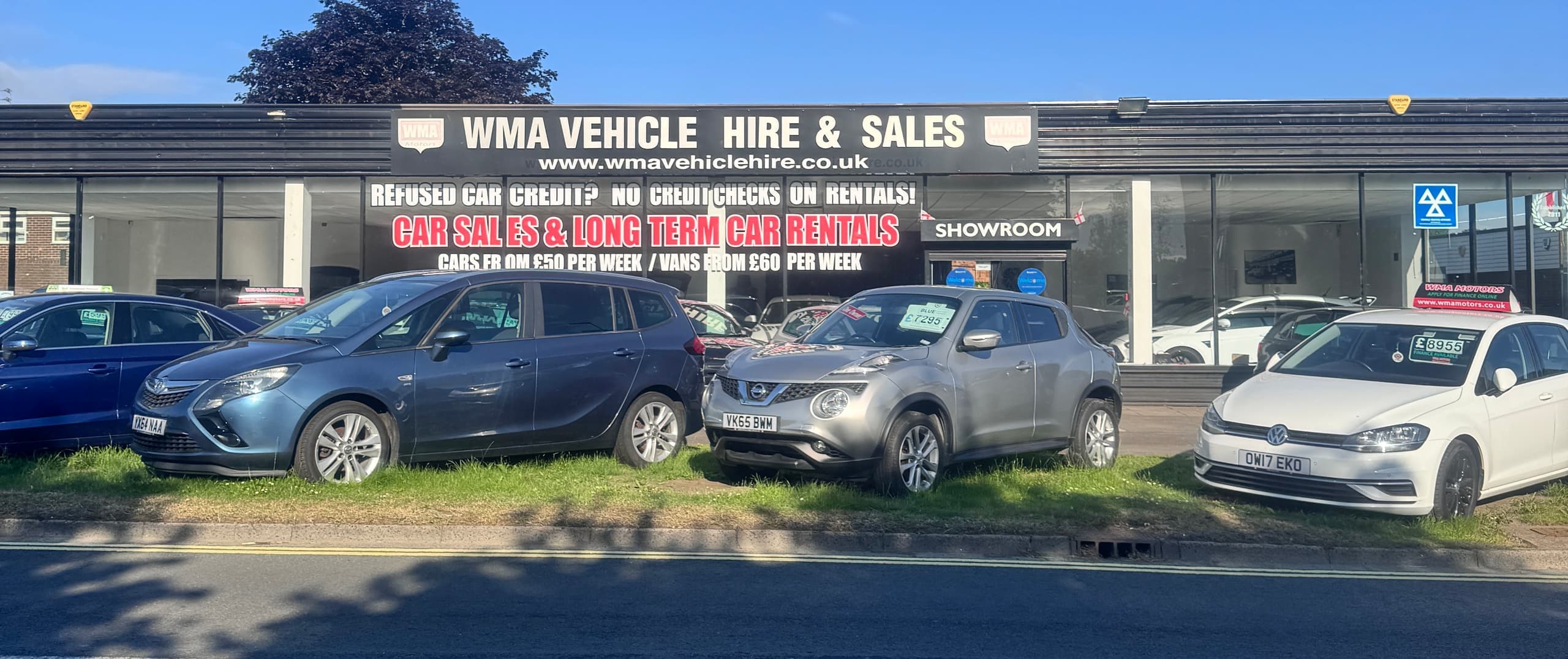 The WMA Motors forecourt in Bedlington, with hire cars lined up outside the showroom