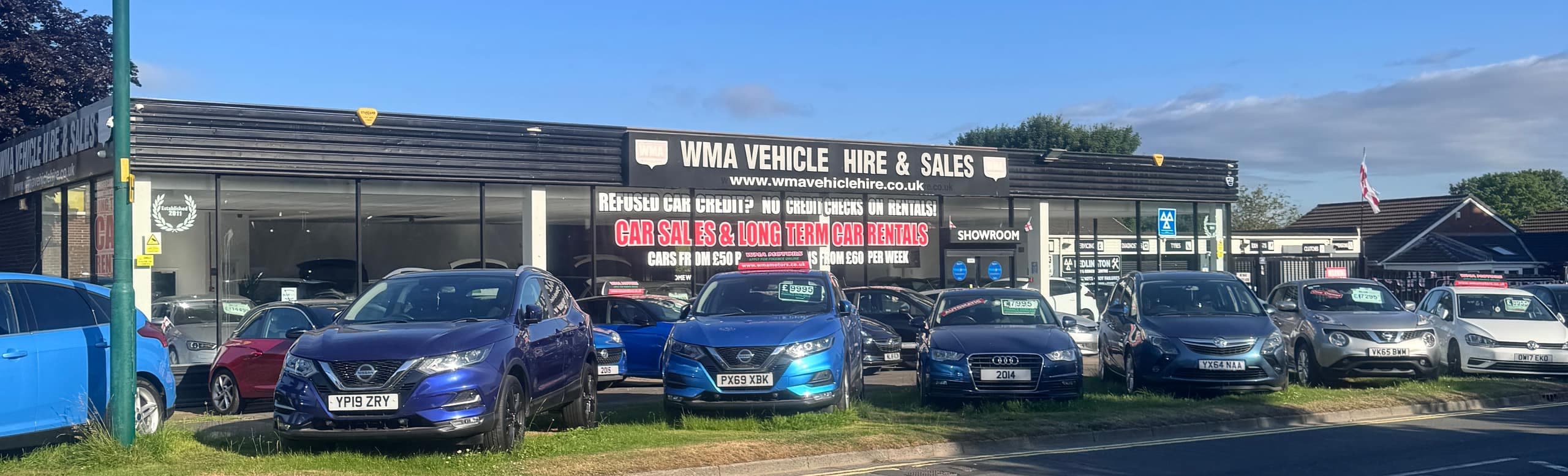 Rent-to-own cars lined up on the WMA Motors forecourt in Bedlington